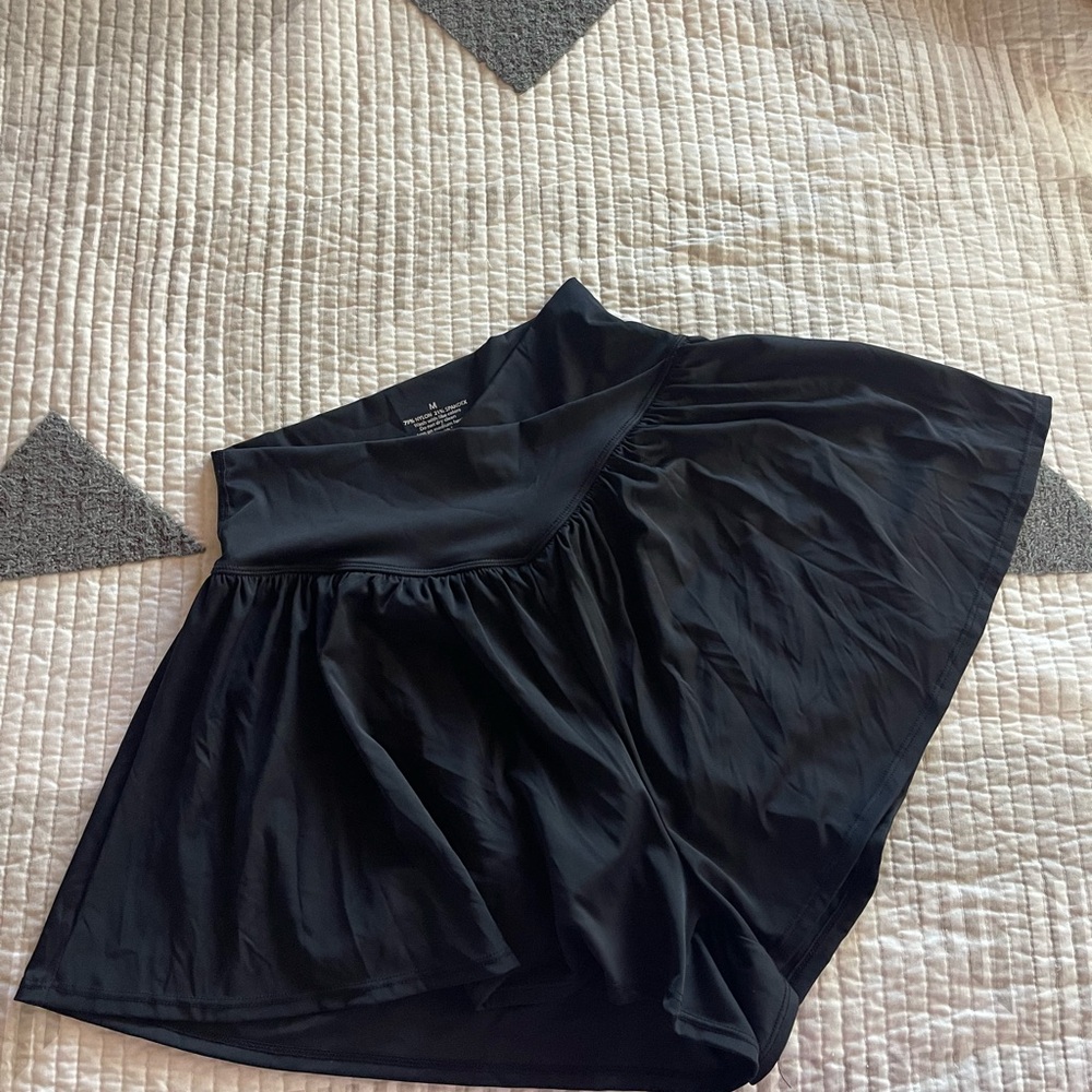 Black Flowy Shorts with built in shorts. Super soft stylish and sleek black